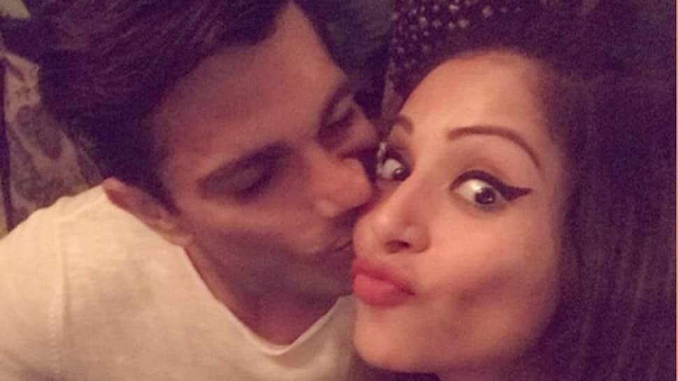 Bipasha Basu and Karan Singh Grover&#039;s kiss on the beach will give you couple goals! Pic proof