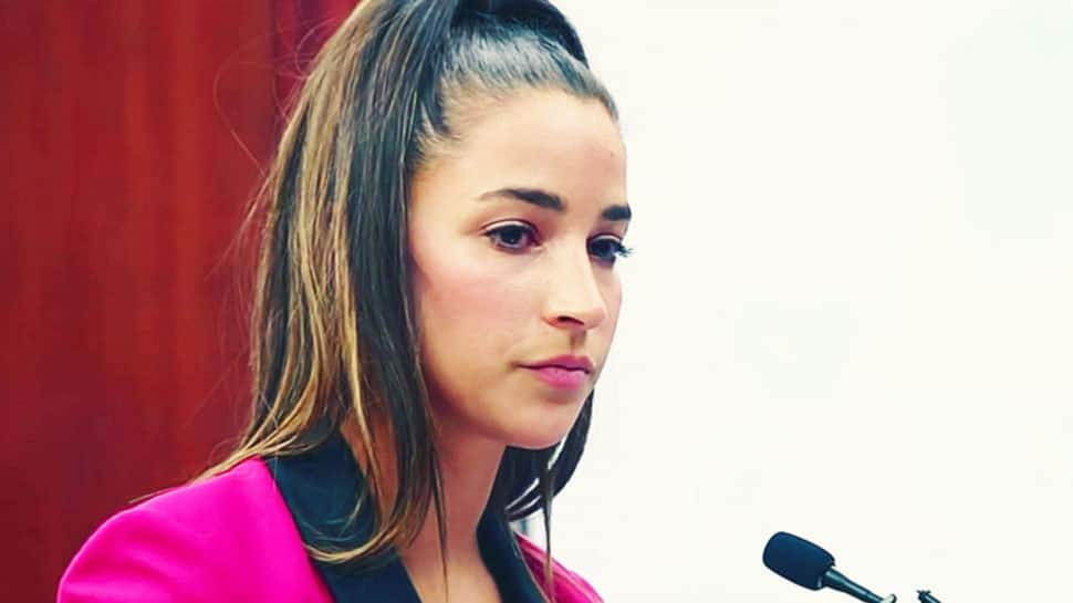 Gymnast Aly Raisman sues U.S. Olympic Committee over Larry Nassar abuse
