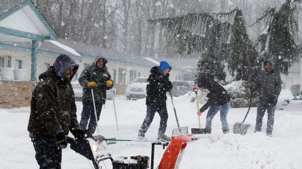 US Northeast still facing flooding, outages after killer storm