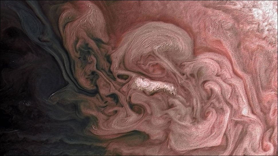 Flying across Jupiter&#039;s clouds, NASA&#039;s Juno gets close to a &#039;rosy&#039; storm – See pic