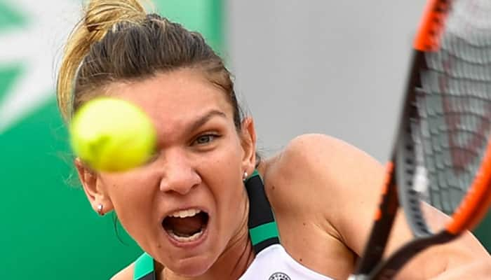 Top-ranked Simona Halep survives scare to reach third round of Miami Open