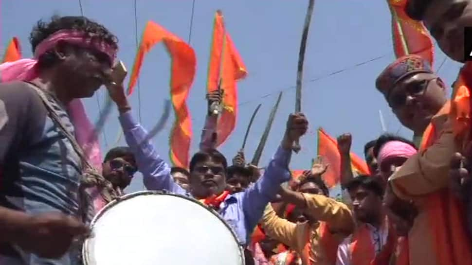 Hindu Yuva Vahini members brandish swords during Ram Navami procession