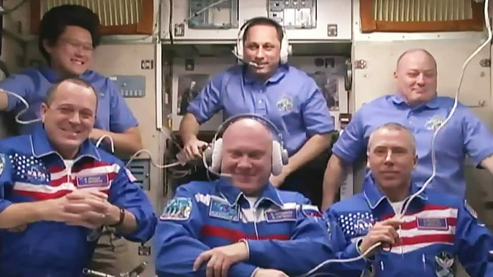 Expedition 56 crew members welcomed aboard the space station