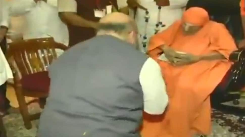 Watch: BJP president Amit Shah visits Siddaganga Mutt, meets Shivakumara Swami