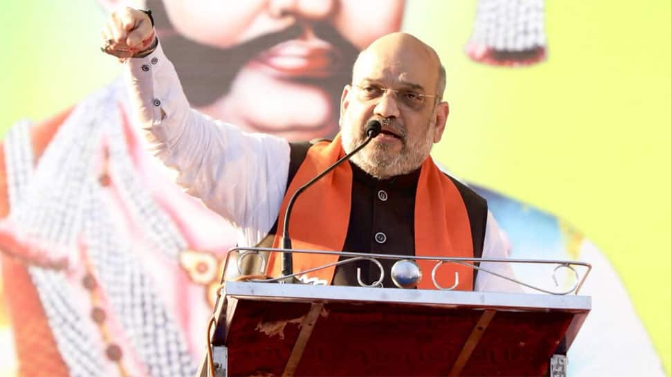 Karnataka polls: Amit Shah accuses Siddaramaiah government of &#039;dividing&#039; Hindus