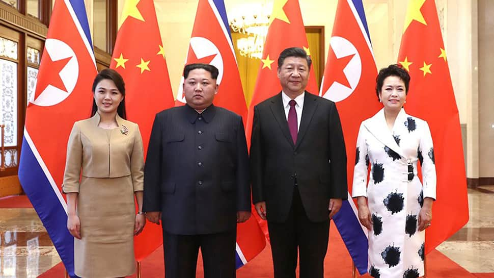 Kim Jong Un makes first foreign visit as North Korea ruler, meets Xi Jinping in Beijing