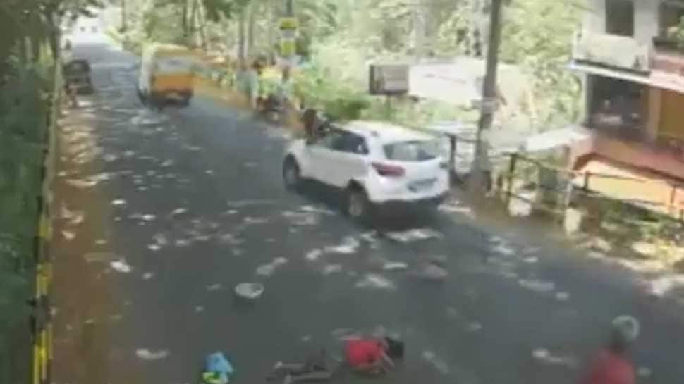 Caught on camera: Kerala woman lying on busy road, none comes to her rescue