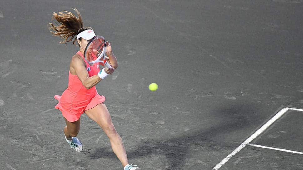 Alize Cornet upsets Caroline Garcia to advance in Charleston Open