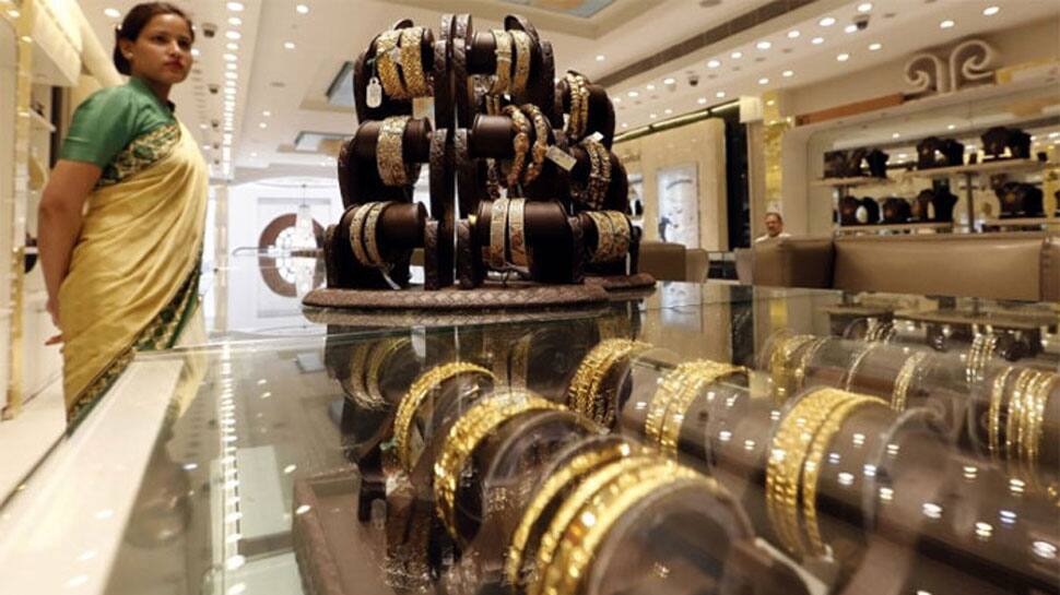 Gold tops 32,000-mark on firm global cues, jeweller buying Gold tops 32,000-mark on firm global cues, jeweller buying