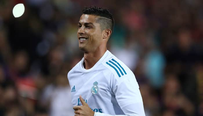 Ronaldo backheel earns Real late draw, Valencia lose