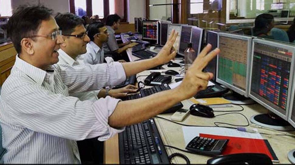 Sensex spurts 96 points in see-saw trade; metals shine