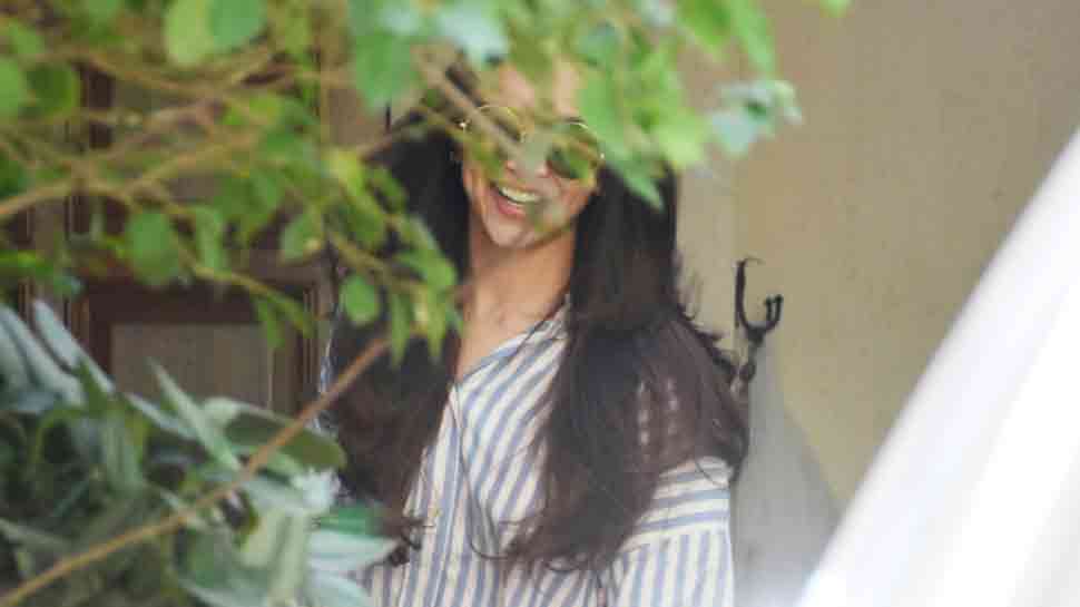 Deepika Padukone cracks up a pretty laugh as she gets snapped outside a salon