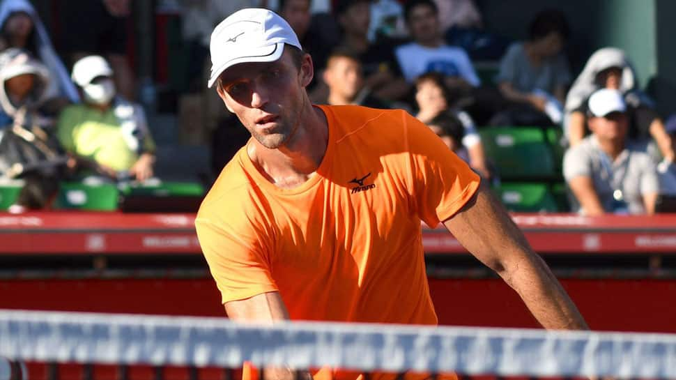 Karlovic beats former Barcelona Open tennis champion Robredo