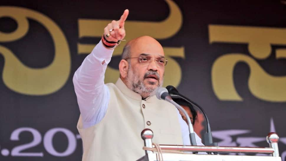  Amit Shah attacks Rahul Gandhi over his meeting with Lalu  Prasad Yadav, calls Congress chief &#039;double-faced&#039;