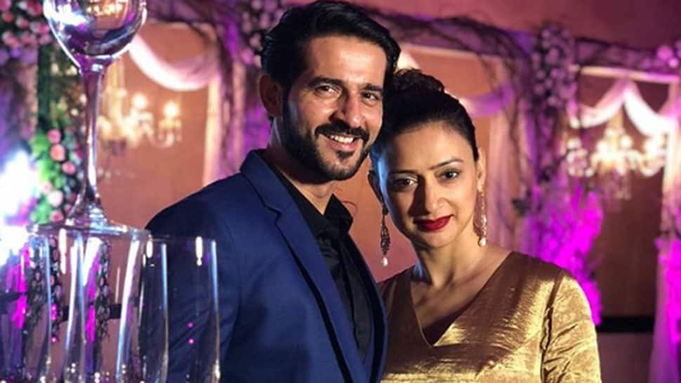 Former &#039;Bigg Boss 11&#039; contestant Hiten Tejwani locks lips with wifey Gauri and the pic defines couple goals!