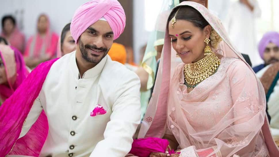 Neha Dhupia marries Angad Bedi, shares adorable pic on Twitter