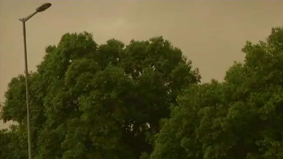 Dust storm, squall hits national capital region, brings mercury down