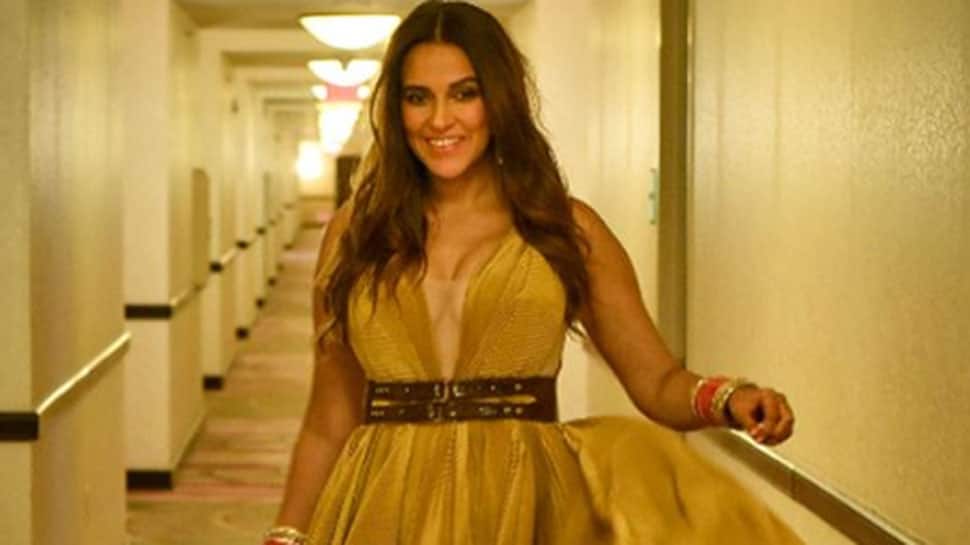 Neha Dhupia flaunts her chooda with a designer gown and she looks uber classy—Pics inside