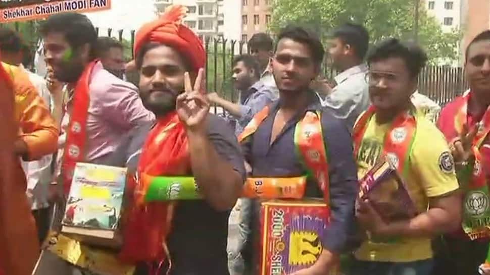 Karnataka election results: BJP workers celebrate in Delhi