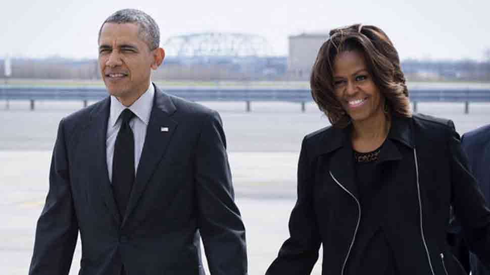 Netflix says it has signed Barack and Michelle Obama