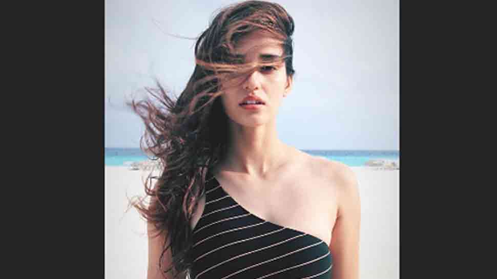 Disha Patani looks alluring by posing in black swimwear—Check out pics