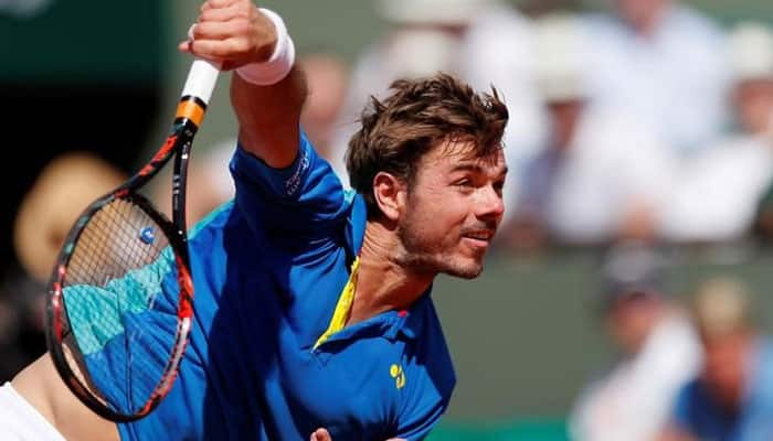 Stan Wawrinka crashes out in French Open first round, Novak Djokovic through