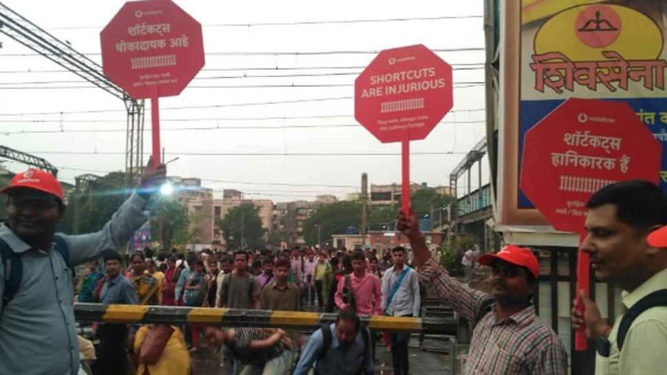 &#039;Shortcuts are injurious&#039;: Vodafone conducts campaign in Mumbai on danger of crossing Railway tracks