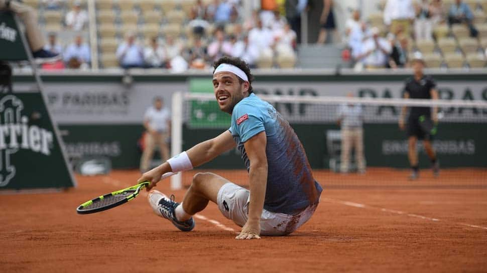 Italian Marco Cecchinato upsets David Goffin to reach last eight