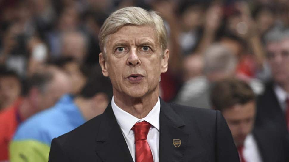 Soccer: Arsene Wenger cautious of &#039;&#039;crazy challenge&#039;&#039; as he ponders future