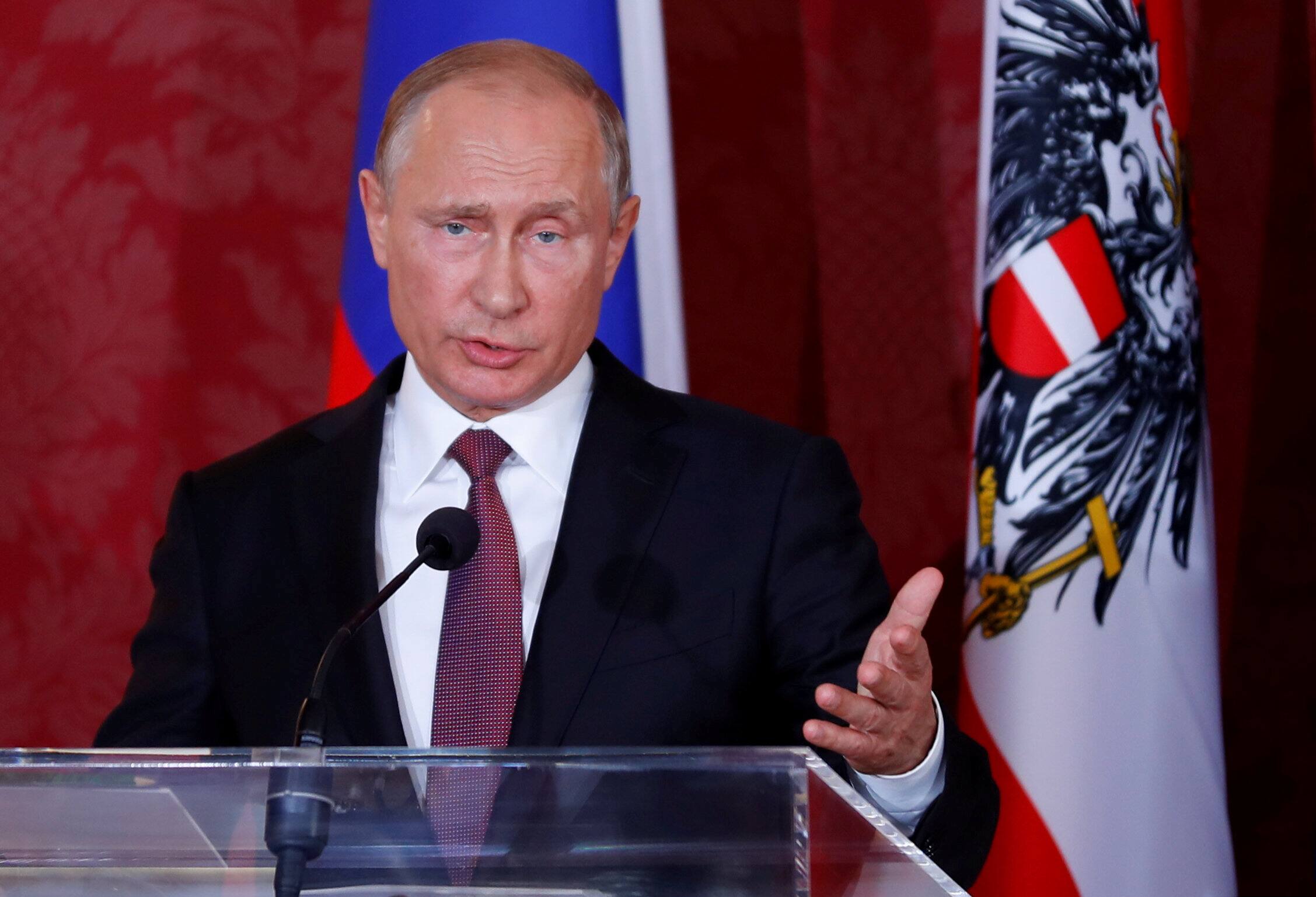 Putin says lifting sanctions on Moscow will benefit all