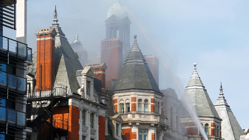 Massive fire engulfs London's Mandarin Oriental hotel, over 100 firefighters rushed