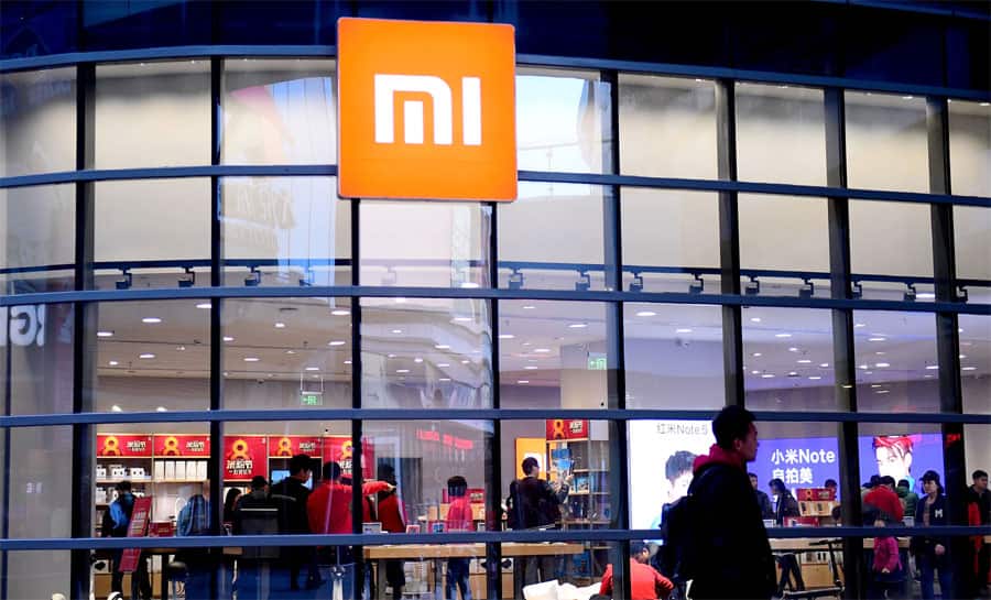 Xiaomi logs $1 billion first-quarter loss but record overseas revenue ahead of IPO