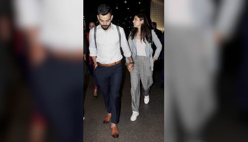 Anushka Sharma- Virat Kohli Glow as They Walk Hand-in-Hand at Mumbai  Airport- PICS