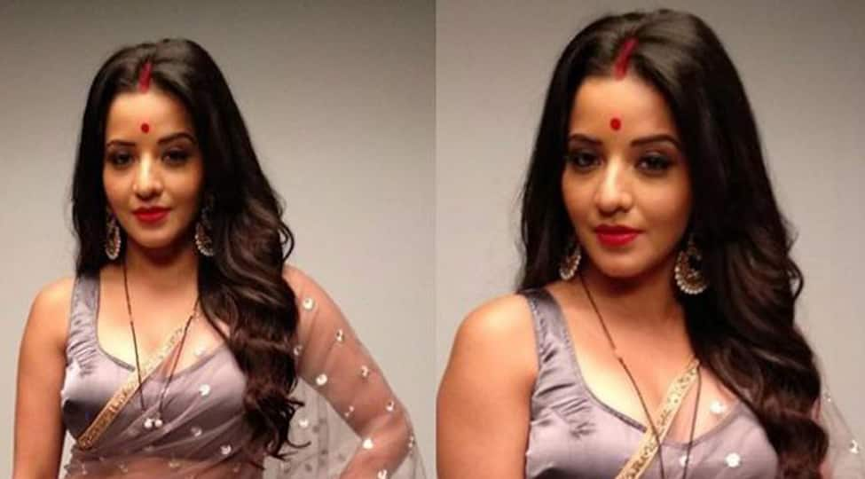 Bhojpuri actress Monalisa aka Jhuma Boudi sizzles in a sheer saree 