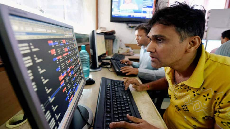 Stock markets end marginally negative on weak global cues, trade war fears