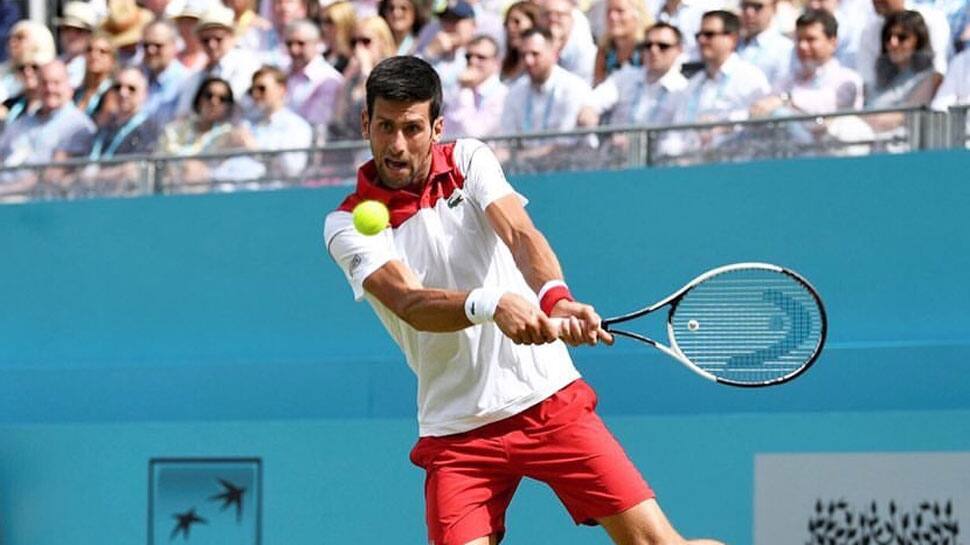 Novak Djokovic says not among favourites at Wimbledon, backs Roger Federer