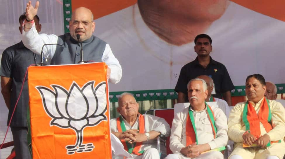 Amit Shah lashes out at Congress, says BJP will never allow separation of J&amp;K from India