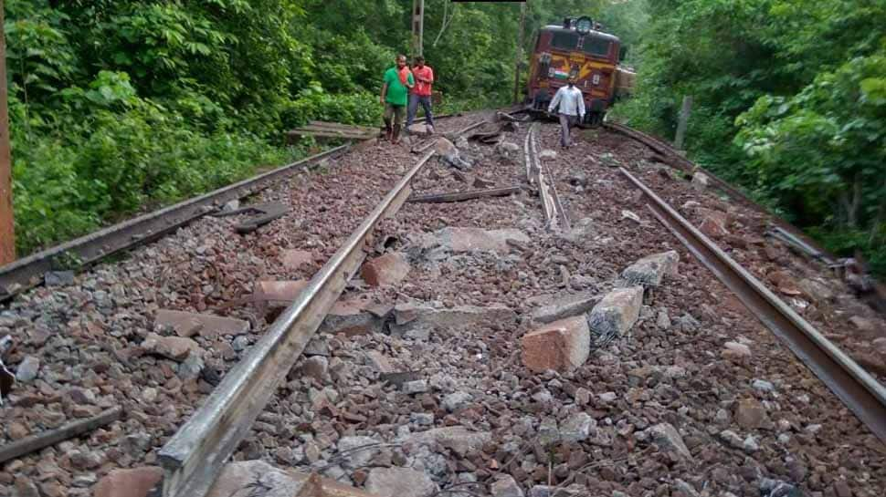 Goods train wagons fall off bridge after Naxals uproot tracks