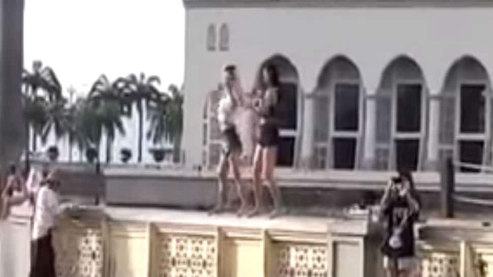 Malaysia throws out Chinese women tourists for dancing outside mosque