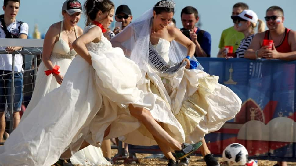 &#039;Not only a man&#039;s game&#039;: Russian women play soccer wearing bridal dresses, running shoes - In pics