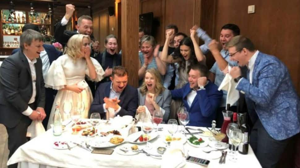 Russian couple stops wedding to watch home team knock Spain out of FIFA World Cup 2018