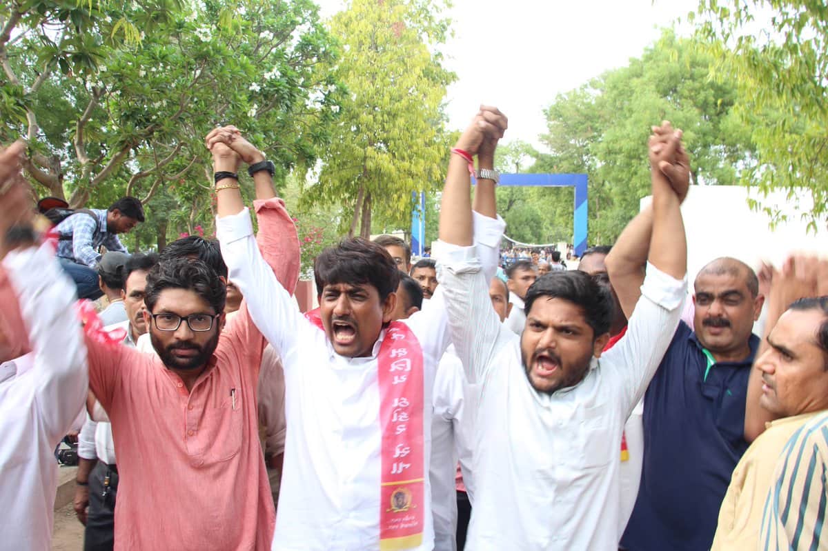 Hardik Patel, Jignesh Mevani and Alpesh Thakor booked for raiding woman's home; trio blame liquor mafia Hardik Patel, Jignesh Mevani and Alpesh Thakor booked for raiding woman's home; trio blame liquor mafia