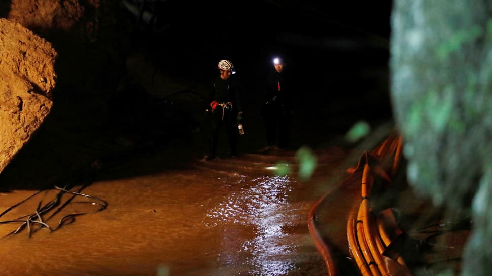 Rains hit Thai cave where rescuers face ‘war with water and time’ to save children