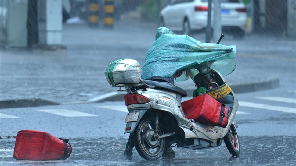 Watch: Mumbaikars wade through water-logged roads