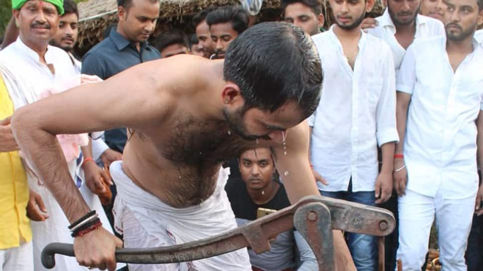 In pics: Tej Pratap Yadav takes a bath at Dalit’s home in Mahua