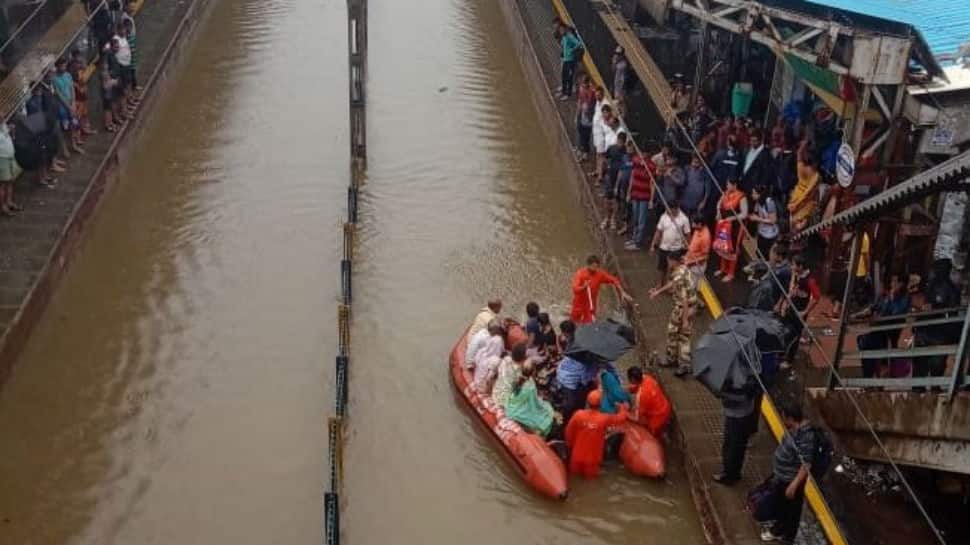 NDRF rescues close to 2000 passengers stranded in Mumbai-bound trains