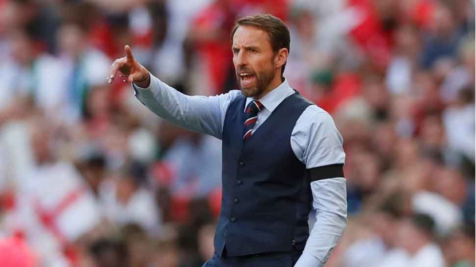 #WaistcoatWednesday: England fans suit up ahead of FIFA World Cup 2018 semifinal
