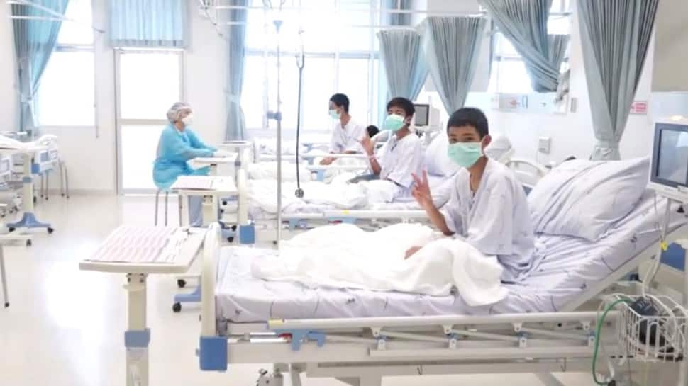 Watch: Staff gets emotional as rescued Thai Boys wave and smile from hospital beds