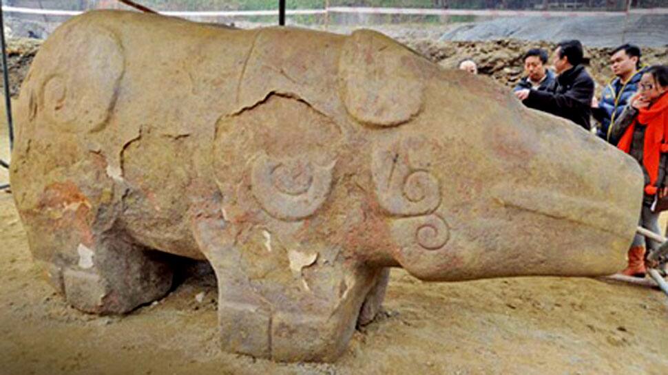 Residents of Chinese city demand return of ancient rhino statue, blame its relocation for floods