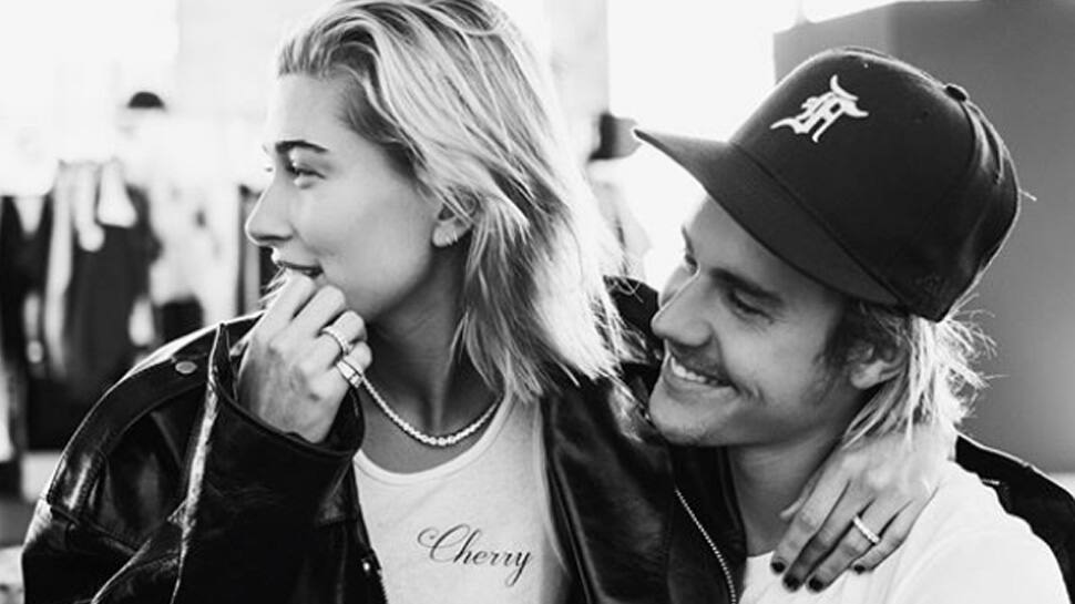 Justin Bieber shares a passionate kiss in the pool with fiance Hailey Baldwin—Pic